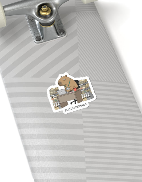 Load image into Gallery viewer, Status: Pending — Raccoon at Desk Kiss-Cut Sticker | Unhinged Animal Bureaucracy

