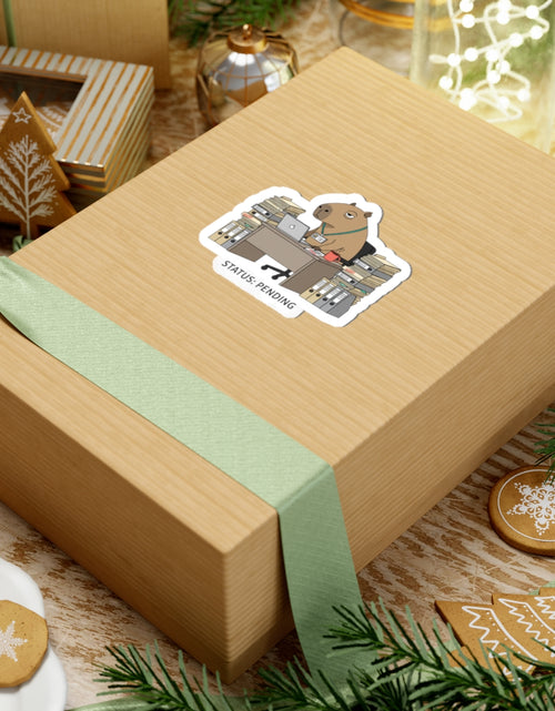Load image into Gallery viewer, Status: Pending — Raccoon at Desk Kiss-Cut Sticker | Unhinged Animal Bureaucracy
