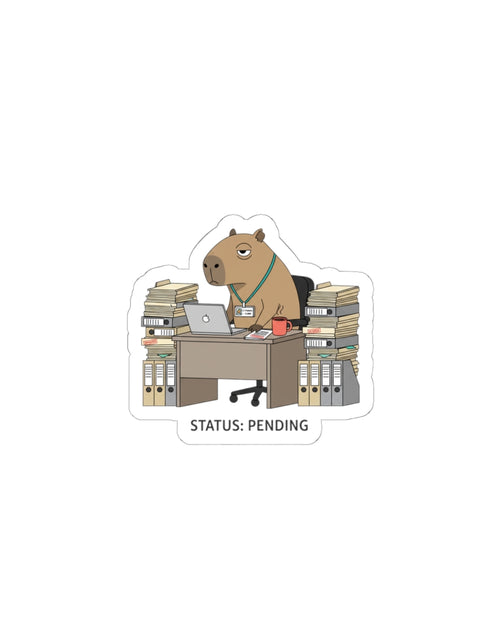 Load image into Gallery viewer, Status: Pending — Raccoon at Desk Kiss-Cut Sticker | Unhinged Animal Bureaucracy
